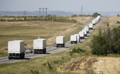 Белые «КамАЗы» МЧС доставили гуманитарный груз в Донецк и вернулись в Россию